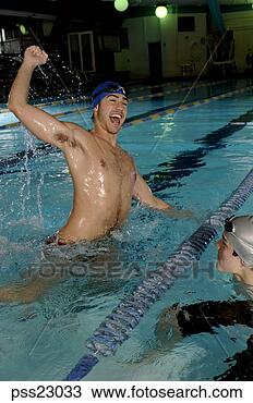 Stock Photo - male swimmer celebrating 
victory in swimming 
pool. fotosearch 
- search stock 
photos, pictures, 
images, and photo 
clipart
