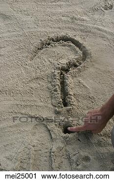 Stock Photography - man drawing question 
mark in sand. 
fotosearch - search 
stock photos, 
pictures, images, 
and photo clipart