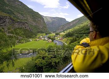 Stock Photography - man looking out 
window at countryside. 
fotosearch - search 
stock photos, 
pictures, images, 
and photo clipart