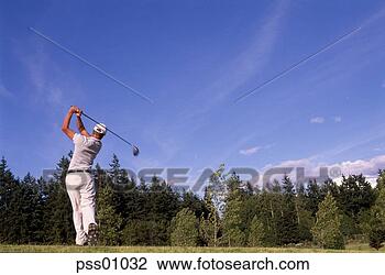 Stock Photo - man swinging golf 
club. fotosearch 
- search stock 
photos, pictures, 
images, and photo 
clipart