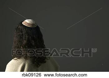 Stock Photo - man wearing yarmulke. 
fotosearch - search 
stock photos, 
pictures, images, 
and photo clipart