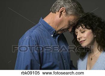 Stock Image - man and woman 
comforting each 
other. fotosearch 
- search stock 
photos, pictures, 
images, and photo 
clipart