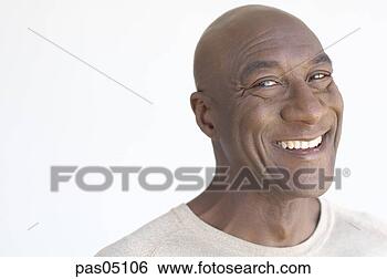 Stock Photo - mature african 
man smiling. fotosearch 
- search stock 
photos, pictures, 
images, and photo 
clipart