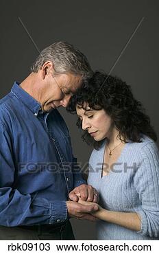 Stock Photo - mature couple 
comforting each 
other. fotosearch 
- search stock 
photos, pictures, 
images, and photo 
clipart