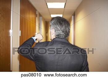 Stock Photography - middle aged businessman 
checking time. 
fotosearch - search 
stock photos, 
pictures, images, 
and photo clipart