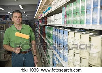 Stock Photo - middle aged man 
shopping in paint 
store. fotosearch 
- search stock 
photos, pictures, 
images, and photo 
clipart