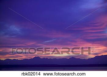 Stock Photo - mountains and 
clouds at sunset. 
fotosearch - search 
stock photos, 
pictures, images, 
and photo clipart