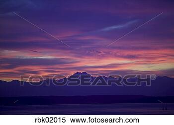 Stock Image - mountains and 
clouds at sunset. 
fotosearch - search 
stock photos, 
pictures, images, 
and photo clipart