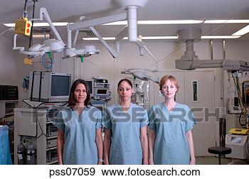 Stock Photograph - multi-ethnic females 
in surgical scrubs. 
fotosearch - search 
stock photos, 
pictures, images, 
and photo clipart