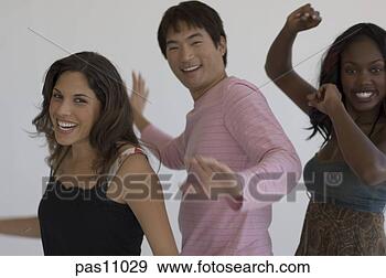 Stock Photograph - multi-ethnic friends 
dancing. fotosearch 
- search stock 
photos, pictures, 
images, and photo 
clipart