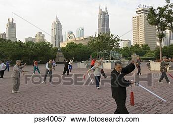 Picture - people practicing 
with swords in 
park,  people's 
square,  shanghai. 
fotosearch - search 
stock photos, 
pictures, images, 
and photo clipart
