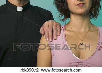 Stock Photo - priest with hand 
on woman’s shoulder. 
fotosearch - search 
stock photos, 
pictures, images, 
and photo clipart