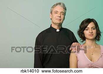 Stock Photography - priest with hand 
on woman’s shoulder. 
fotosearch - search 
stock photos, 
pictures, images, 
and photo clipart
