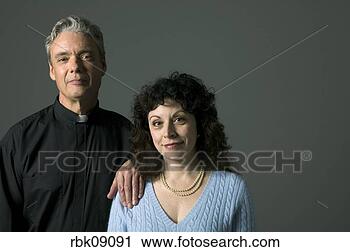 Stock Photography - priest and woman 
smiling. fotosearch 
- search stock 
photos, pictures, 
images, and photo 
clipart