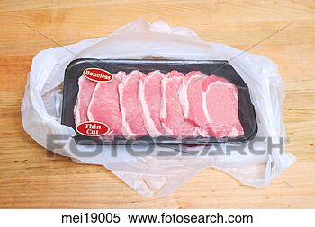 Stock Image - raw meat in package. 
fotosearch - search 
stock photos, 
pictures, images, 
and photo clipart