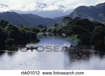 Stock Photo - row boat on river, 
new zealand. fotosearch 
- search stock 
photos, pictures, 
images, and photo 
clipart