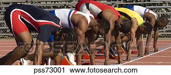Stock Photography - runners at starting 
block. fotosearch 
- search stock 
photos, pictures, 
images, and photo 
clipart