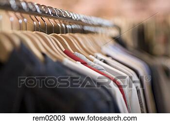 Stock Photo - shirts on clothes 
rack in clothing 
store. fotosearch 
- search stock 
photos, pictures, 
images, and photo 
clipart