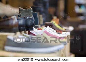 Stock Photography - shoes on shelf 
in clothing store. 
fotosearch - search 
stock photos, 
pictures, images, 
and photo clipart