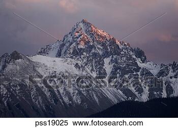 Stock Image - snow covered mountain, 
rocky mountains. 
fotosearch - search 
stock photos, 
pictures, images, 
and photo clipart