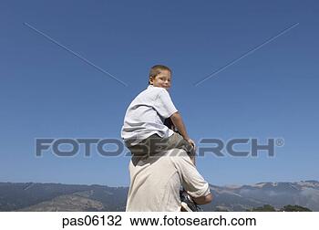 Stock Photo - son riding on 
father’s shoulders. 
fotosearch - search 
stock photos, 
pictures, images, 
and photo clipart