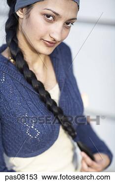 Stock Photo - teenage middle 
eastern girl with 
long braid. fotosearch 
- search stock 
photos, pictures, 
images, and photo 
clipart