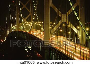 Stock Image - time-lapse view 
of traffic on 
the bay bridge 
at night,  san. 
fotosearch - search 
stock photos, 
pictures, images, 
and photo clipart