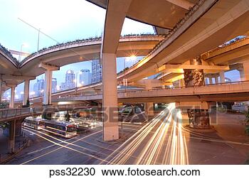 Stock Photography - timed exposure 
of traffic under 
raised highway. 
fotosearch - search 
stock photos, 
pictures, images, 
and photo clipart