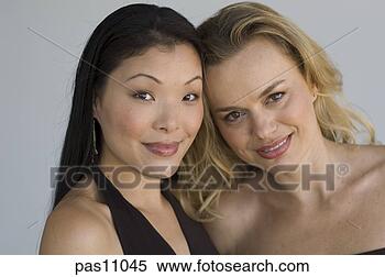 Stock Image - two women smiling. 
fotosearch - search 
stock photos, 
pictures, images, 
and photo clipart