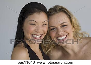 Stock Photo - two women smiling. 
fotosearch - search 
stock photos, 
pictures, images, 
and photo clipart