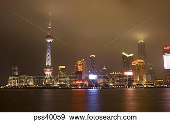 Stock Photograph - view of city skyline 
at night with 
the oriental pearl 
tower,  pudong. 
fotosearch - search 
stock photos, 
pictures, images, 
and photo clipart
