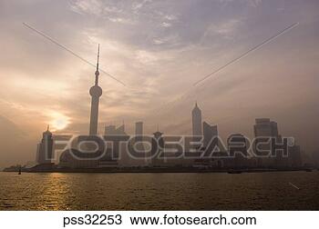 Stock Photo - view of the pudong 
city skyline at 
sunrise, shanghai, 
china. fotosearch 
- search stock 
photos, pictures, 
images, and photo 
clipart