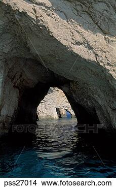 Stock Photo - view of sea through 
natural rock archway. 
fotosearch - search 
stock photos, 
pictures, images, 
and photo clipart