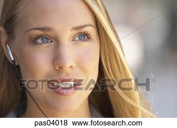 Stock Photo - woman in headset. 
fotosearch - search 
stock photos, 
pictures, images, 
and photo clipart