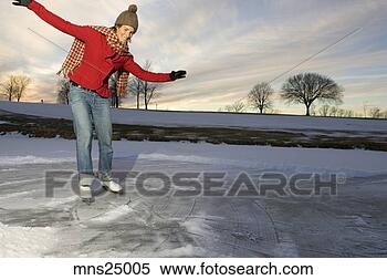 Stock Image - woman ice-skating. 
fotosearch - search 
stock photos, 
pictures, images, 
and photo clipart