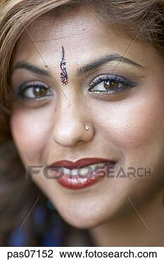 Stock Photo - woman of indian 
ethnicity smiling. 
fotosearch - search 
stock photos, 
pictures, images, 
and photo clipart