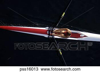Stock Photo - woman rowing sculling 
boat. fotosearch 
- search stock 
photos, pictures, 
images, and photo 
clipart