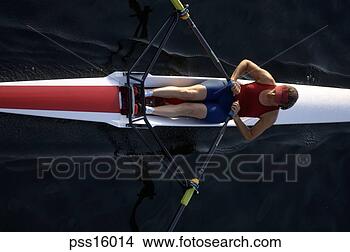 Stock Photo - woman rowing sculling 
boat. fotosearch 
- search stock 
photos, pictures, 
images, and photo 
clipart