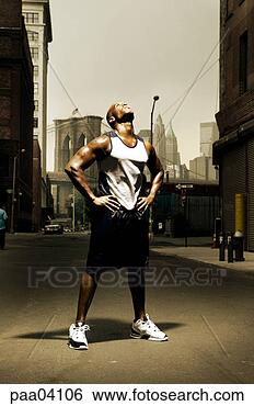 Stock Photo - young african 
male athlete in 
city. fotosearch 
- search stock 
photos, pictures, 
images, and photo 
clipart