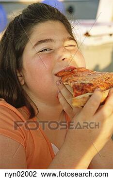 Stock Photo - young girl eating 
pizza. fotosearch 
- search stock 
photos, pictures, 
images, and photo 
clipart