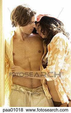 Stock Photo - young hispanic 
couple hugging. 
fotosearch - search 
stock photos, 
pictures, images, 
and photo clipart