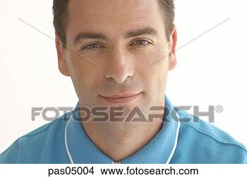 Stock Photo - young hispanic 
man smiling. fotosearch 
- search stock 
photos, pictures, 
images, and photo 
clipart
