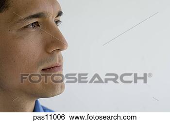 Stock Photo - young hispanic 
man smiling. fotosearch 
- search stock 
photos, pictures, 
images, and photo 
clipart