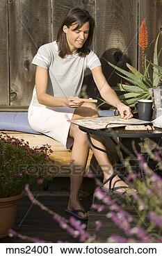 Stock Photography - young woman playing 
board game. fotosearch 
- search stock 
photos, pictures, 
images, and photo 
clipart