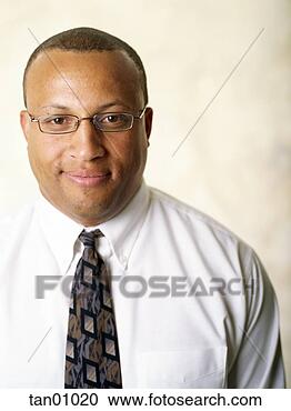 Stock Photography - african businessman 
smiling. fotosearch 
- search stock 
photos, pictures, 
images, and photo 
clipart