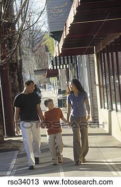 Stock Photo - african family 
walking on sidewalk. 
fotosearch - search 
stock photos, 
pictures, images, 
and photo clipart