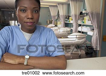 Stock Photo - african female 
nurse in hospital 
ward. fotosearch 
- search stock 
photos, pictures, 
images, and photo 
clipart