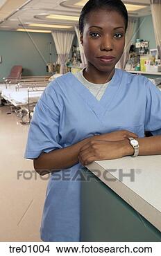 Stock Photo - african female 
nurse in hospital 
ward. fotosearch 
- search stock 
photos, pictures, 
images, and photo 
clipart