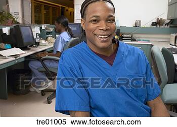 Stock Image - african male nurse 
in hospital room. 
fotosearch - search 
stock photos, 
pictures, images, 
and photo clipart