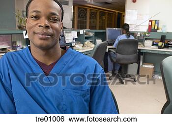 Stock Photo - african male nurse 
in hospital room. 
fotosearch - search 
stock photos, 
pictures, images, 
and photo clipart